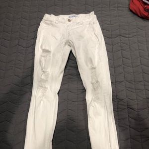 Distressed white jeans
